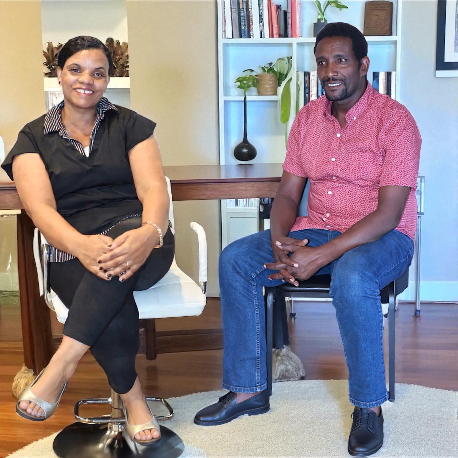 Seated indoor portrait of two people