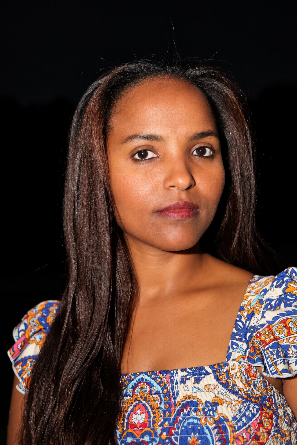 Portrait against a dark background