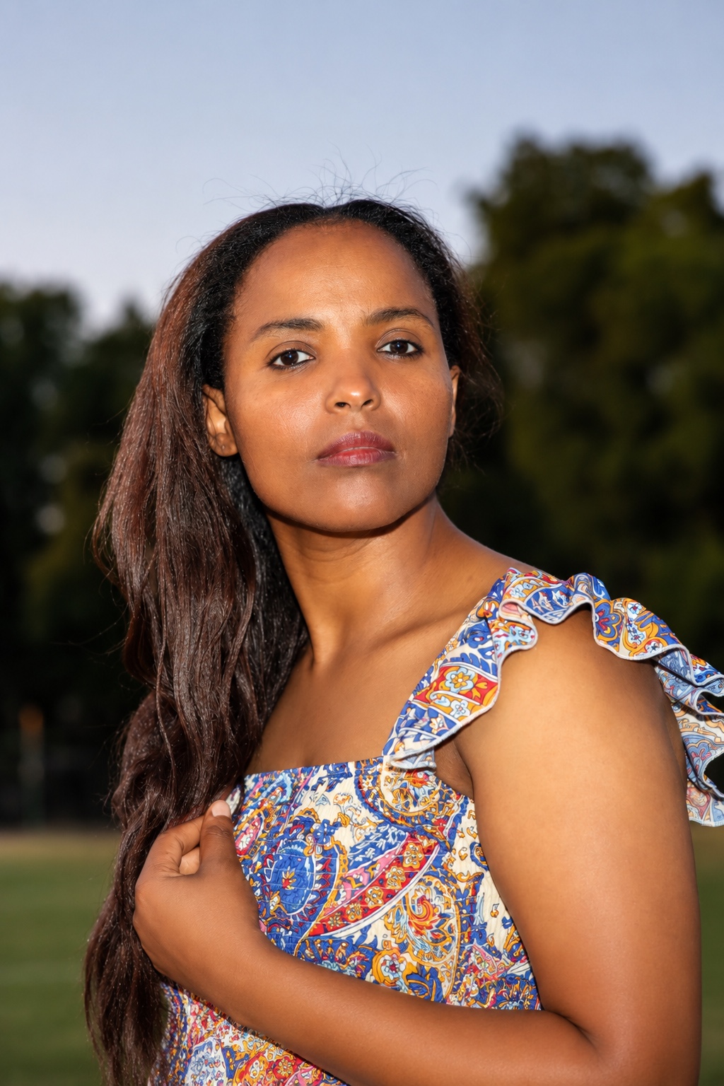 Second outdoor portrait in a patterned dress